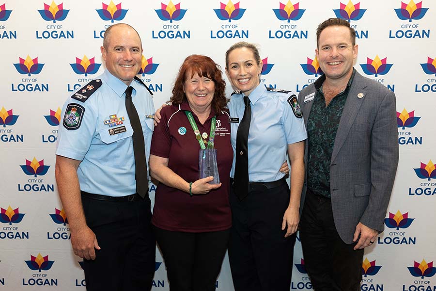 From left: Acting Superintendent Brett Jackson (Queensland Police Service - Logan District), Stan Wells Memorial Award recipient - Ms Sharon Hamilton (Woodlands Neighbourhood Watch), Acting Senior Sergeant Rachel Moffat (QPS Logan District Prevention and