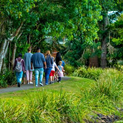 A group of kids and adults bush walking