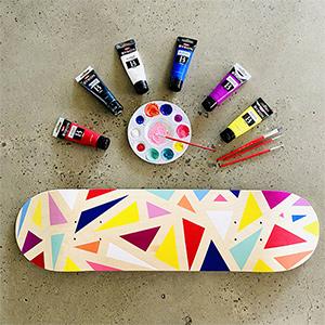 A skateboard with a coloured design