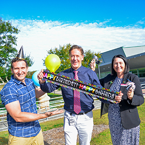 Mayor Darren Power (centre), Lifestyle Chair Cr Tony Hall and Division 2 Cr Teresa Lane look forward to celebrating the Logan Entertainment Centre&#039;s 21st birthday in July.