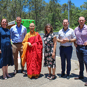 A picture of Mayor Jon Raven (second from right) with Cr Lisa Bradley (centre right) and (from left) Clarks Logan City Bus Service's Kaylee Clark, Federal Member for Rankin Jim Chalmers, Abess Man Wang and State Member for Springwood Mick de Brenni.