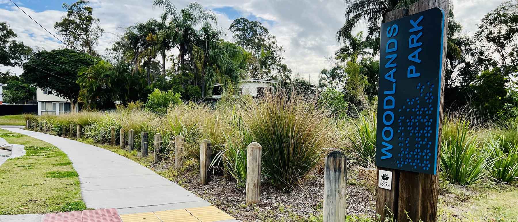 Pathway and Woodlands Drive signage